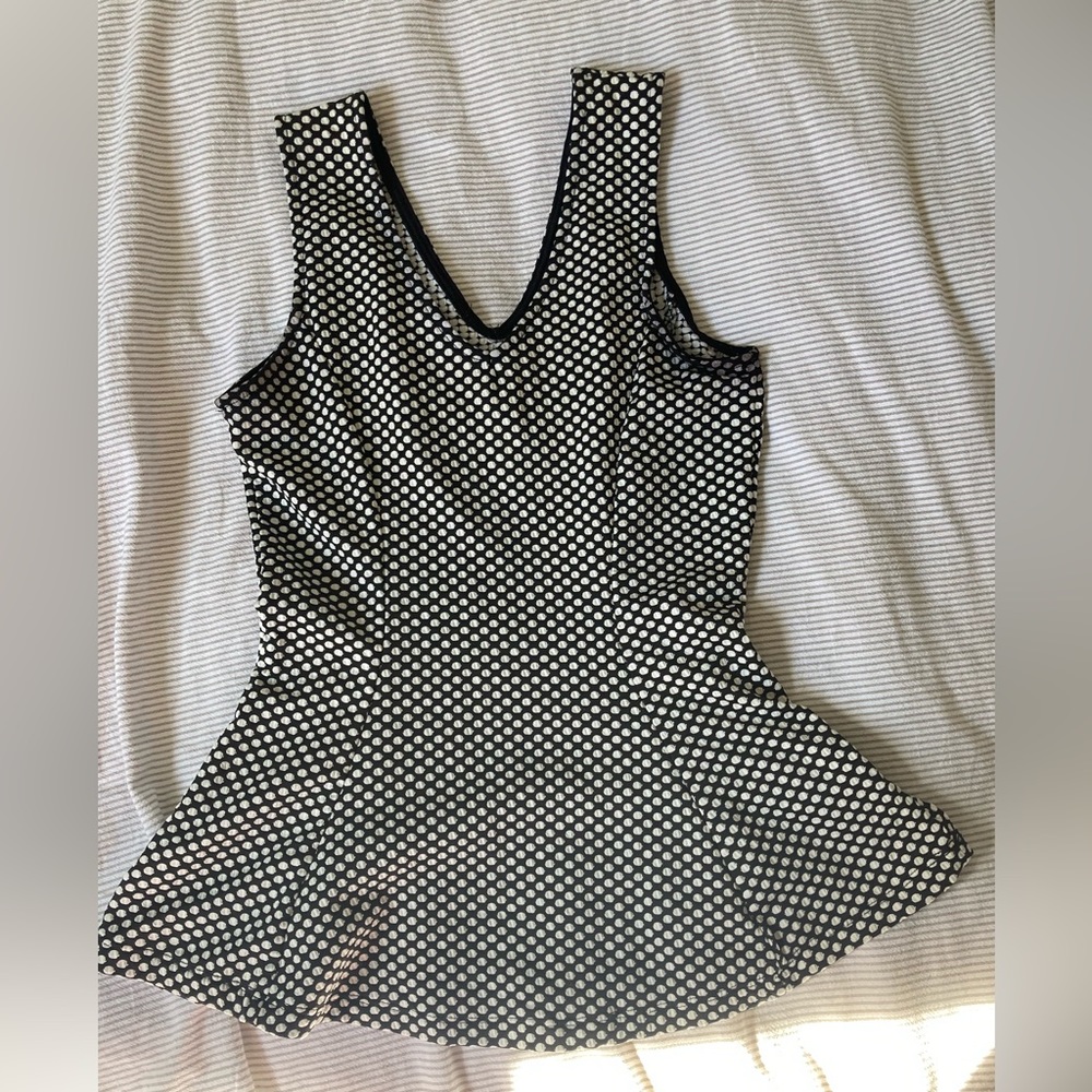 Black and white polka dot peplum top
